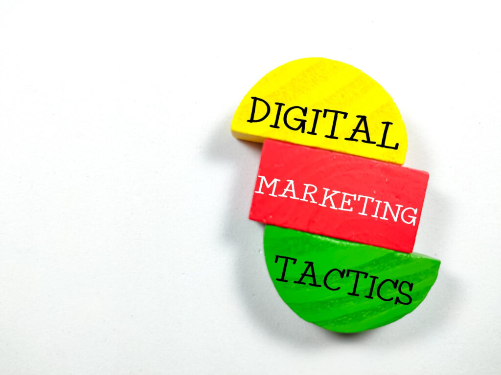 Written Digital Marketing Tactics on a blocks.